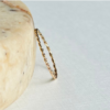 Anillo Twist Sencillo en oro 14K con diseño entrelazado